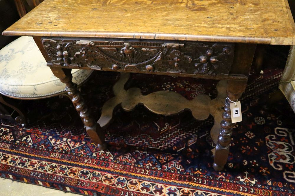 A 17th century and later carved oak side table with spiral-twist supports, width 86cm depth 59cm height 73cm